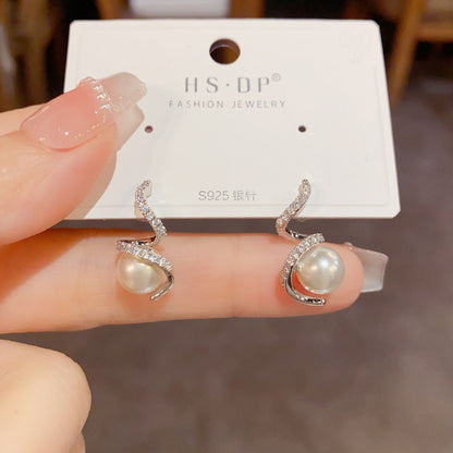 Elegant Pearl and Diamond Stud Earrings